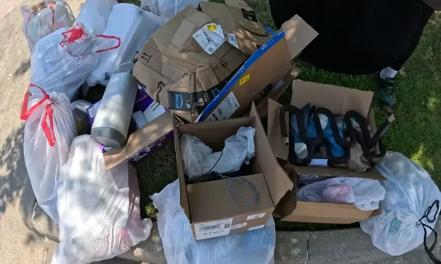 Dumpster rental Fresno job with construction debris loaded for haul-away