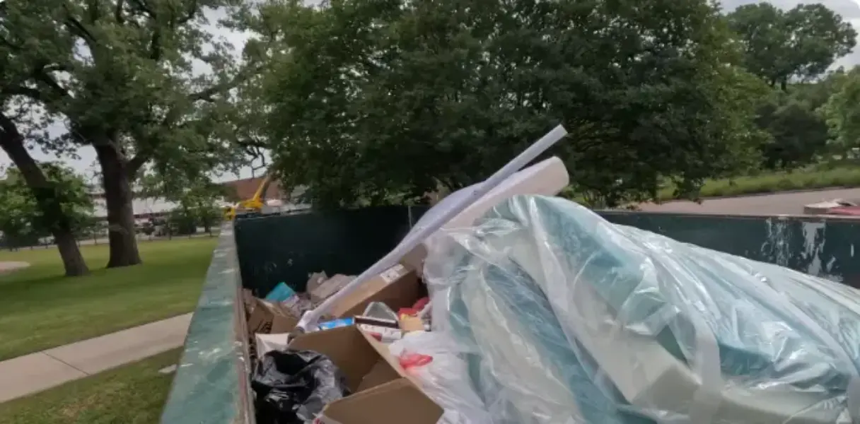 Residential dumpster rental filled during a Fresno cleanout