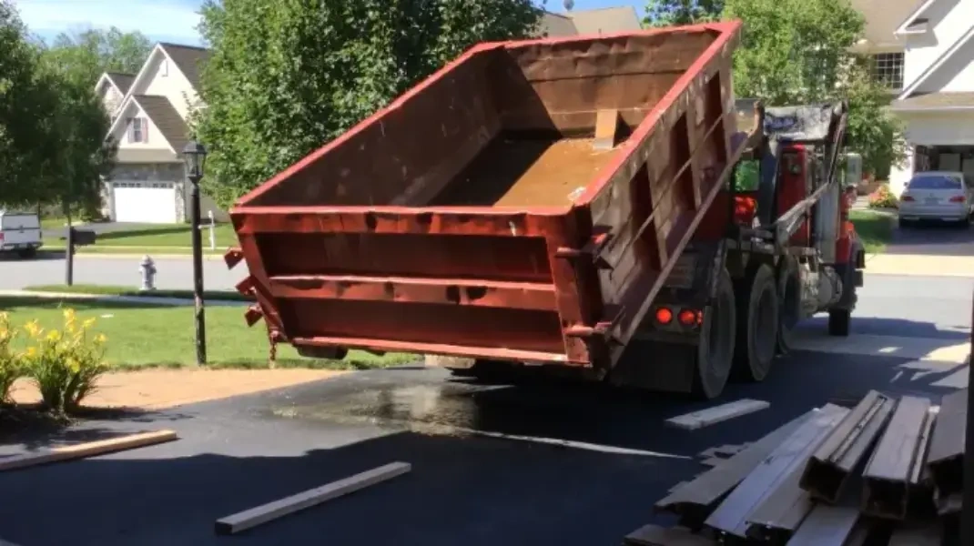 Dumpster rental Clovis CA roll-off delivered to a driveway
